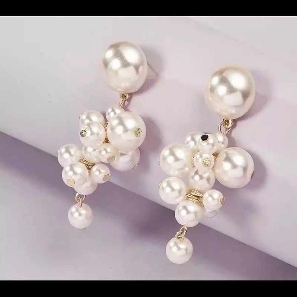 Dangling pearl cluster earrings